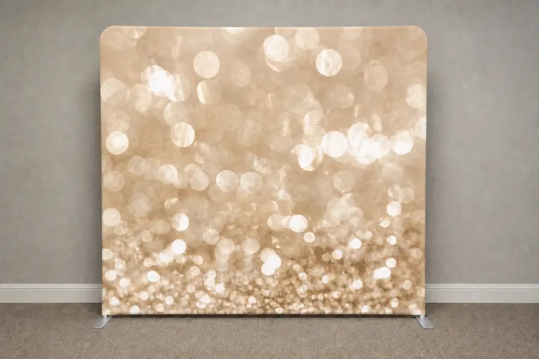 Champagne Sparkle 8 by 8 photo booth backdrop installed in a neutral event space