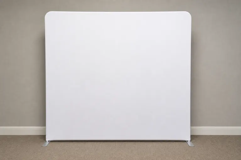 White 8 by 8 photo booth backdrop installed in a neutral event space