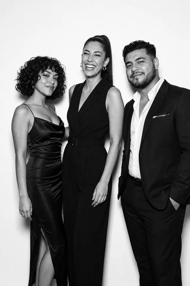 Guests posing for a polished black-and-white Glam Booth portrait, photo 2
