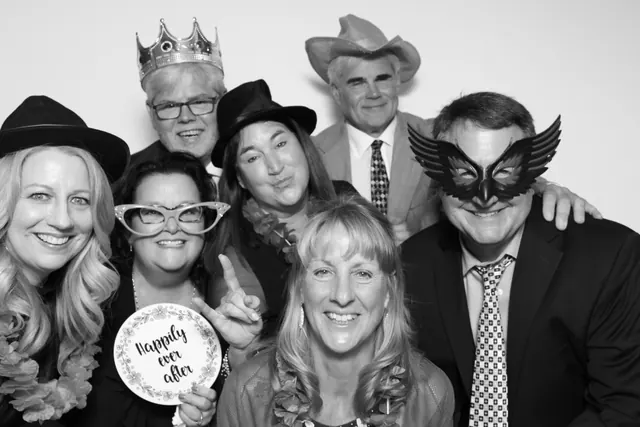 Guests posing for a polished black-and-white Glam Booth portrait, photo 3